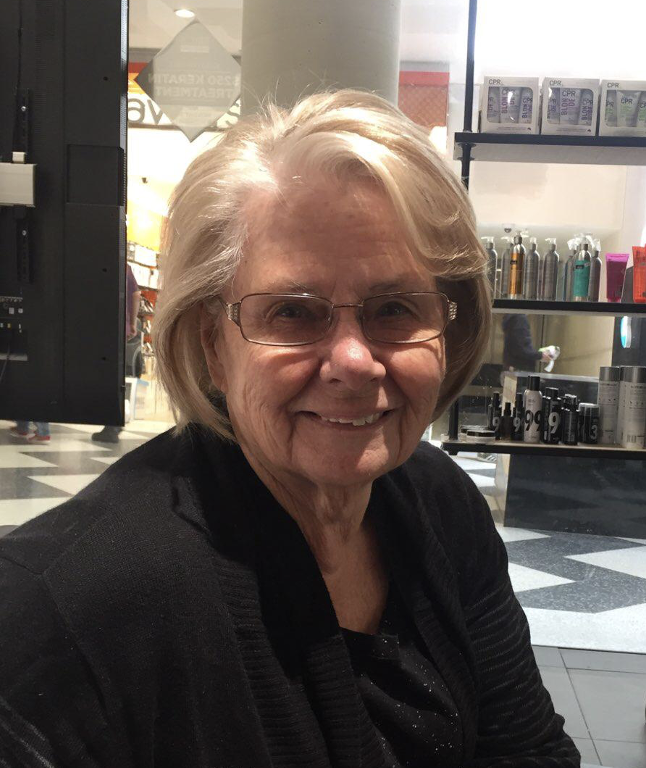 Rowena Greenaway, an older woman with short fair hair and glasses, smiling at the camera.