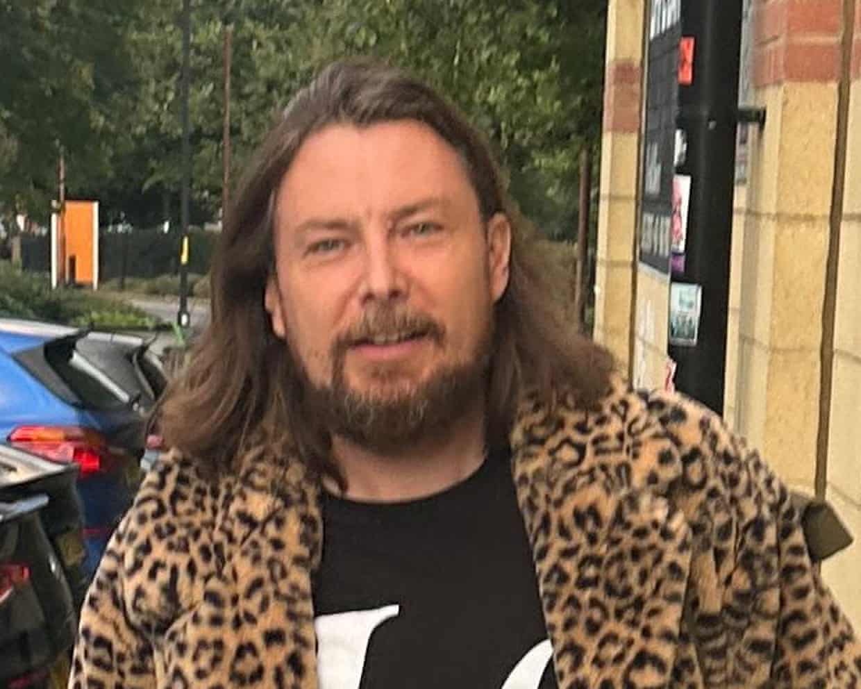 Matt Arnold wearing a ‘La’ T-shirt and leopard print coat