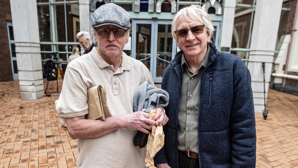 Alan Hall, left, and his brother Greg outside the High Court.